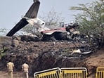 Wreckage of the chartered plane carrying Maharashtra Deputy Chief Minister Ajit Pawar lie mangled and burnt after the aircraft crashed during landing near Baramati airport, in Pune 