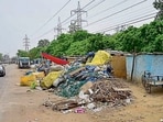 Shanties built on the encroached green belt at Focal Point Industrial Area in Ludhiana on Saturday. (Gurpreet Singh/HT)