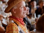 For a wedding with a Hollywood Western dress code, the groom’s godfather dressed as ‘Toy Story’s’ Woody.