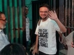 Umar Khalid returning to jail after a brief interim bail earlier this year; his t-shirt carried the words, 