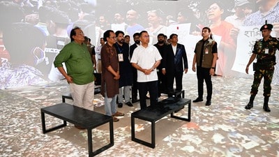 Bangladesh's Prime Minister Tarique Rahman, center, looks at an exhibit at the inauguration of a museum which will serve as a memorial for those killed during the mass uprisings in July 2024, at the former residence of Bangladesh's ousted leader Sheikh Hasina, in Dhaka, Bangladesh, Wednesday, Aug. 5, 2026. (AP Photo/Mahmud Hossain Opu) (AP Photo/Mahmud Hossain Opu) Bangladesh's Prime Minister Tarique Rahman, center, looks at an exhibit at the inauguration of a museum which will serve as a memorial for those killed during the mass uprisings in July 2024, at the former residence of Bangladesh's ousted leader Sheikh Hasina, in Dhaka, Bangladesh, Wednesday, Aug. 5, 2026. (AP Photo/Mahmud Hossain Opu) (AP Photo/Mahmud Hossain Opu)