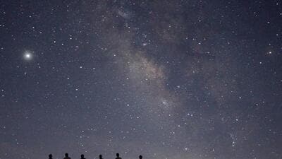 Before long, our eyes would wander upward to the magnificent canvas of the night sky, studded with countless stars. They gently twinkled—not in the exaggerated fashion of old Doordarshan cartoons, but with a serene spell that was far more mesmerising than anything on television. (Representational image) Before long, our eyes would wander upward to the magnificent canvas of the night sky, studded with countless stars. They gently twinkled—not in the exaggerated fashion of old Doordarshan cartoons, but with a serene spell that was far more mesmerising than anything on television. (Representational image)