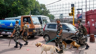 Security personnel inspect the area as preparations are underway for the Independence Day celebrations, at Red Fort, in New Delhi. (PTI)
