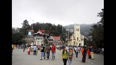Residents and tourists enjoying pleasant, cloudy weather on The Ridge in Shimla on Wednesday. (Deepak Sansta / HT) Residents and tourists enjoying pleasant, cloudy weather on The Ridge in Shimla on Wednesday. (Deepak Sansta / HT)