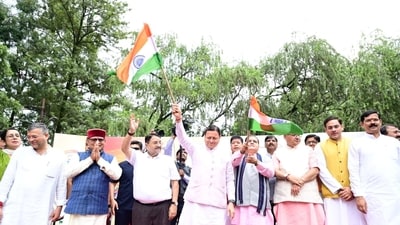 Uttarakhand Chief Minister Pushkar Singh Dhami participates in the Har Ghar Tiranga Yatra in Dehradun on Sunday. Uttarakhand Chief Minister Pushkar Singh Dhami participates in the Har Ghar Tiranga Yatra in Dehradun on Sunday.
