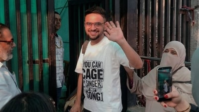 Umar Khalid returning to jail after a brief interim bail earlier this year; his t-shirt carried the words, "You can cage the singer but not the song." (Photo: FB/@UmarKhalidJNU)