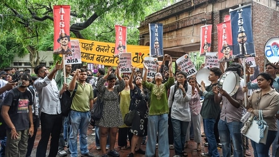 Students stage a protest march against alleged irregularities in the examinations conducted by NTA, at Arts Faculty of Delhi University