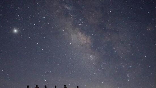 Before long, our eyes would wander upward to the magnificent canvas of the night sky, studded with countless stars. They gently twinkled—not in the exaggerated fashion of old Doordarshan cartoons, but with a serene spell that was far more mesmerising than anything on television. (Representational image)