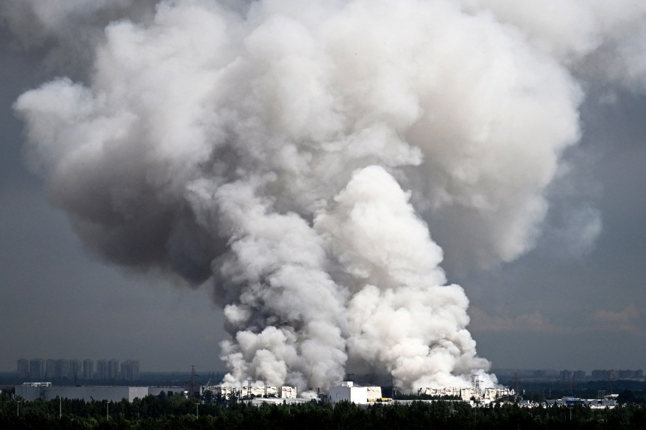 Smoke rising in July from a Wildberries warehouse hit by Ukrainian drones near St. Petersburg, Russia. Smoke rising in July from a Wildberries warehouse hit by Ukrainian drones near St. Petersburg, Russia.