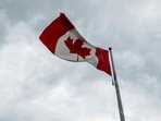 A Canadian flutters at the Canada-US border in Saint-Bernard-de-Lacolle, Quebec, Canada. (Bloomberg)