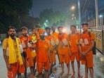 A few among the group of 50 Gen Z Kanwariyas currently making their way from Varanasi to a Lord Shiva temple in Jaunpur. (HT)