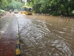 A waterlogged stretch in Sector 40 outside the Jharsa pond on Sunday. (HT Photo)