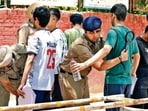 Four candidates were booked after modified electronic devices were allegedly found at a Group D recruitment exam centre in IIT Powa