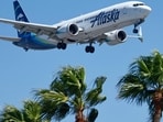 An Alaska Airlines flight that departed Miami International Airport for Seattle was forced to return to the gate on Sunday evening after crew members reported threats from passengers. An Alaska Airlines flight that departed Miami International Airport for Seattle was forced to return to the gate on Sunday evening after crew members reported threats from passengers.