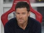 Xabi Alonso reacts ahead of the pre-season friendly soccer match between Chelsea and AC Milan.(AP Photo/Dita Alangkara)