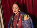 Dressed in a whimsically embroidered silk ensemble by designer Shruti Sancheti paired with schoolgirl braids, a bindi, and hand-painted metallic charms, she offered a lesson in blending old-world craft with modern style.(Photo: Raajessh Kashyap/HT)