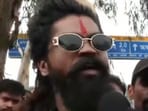 'Pushpa' refers to Pushpa Raj, the fictional character played by Allu Arjun in the Pushpa film. Known for his defiant attitude and the catchphrase 