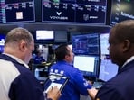 US stocks stayed flat as Iran tensions pushed oil above $80, while Intel fell and investors weighed Fed rate bets, inflation data and key stock moves. (Photographer: Michael Nagle/Bloomberg)(Bloomberg)