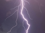 A dramatic video showing a man being struck by lightning while filming a thunderstorm on a golf course near Cincinnati, Ohio, has gone viral on social media. The incident occurred on Friday. A dramatic video showing a man being struck by lightning while filming a thunderstorm on a golf course near Cincinnati, Ohio, has gone viral on social media. The incident occurred on Friday.