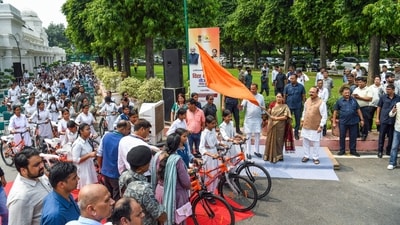 Delhi CM Rekha Gupta distributes bicycles to 200 Class 9 girl students of govt schools (Amit)