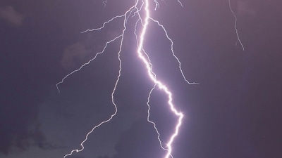 A dramatic video showing a man being struck by lightning while filming a thunderstorm on a golf course near Cincinnati, Ohio, has gone viral on social media. The incident occurred on Friday. (Unsplash)