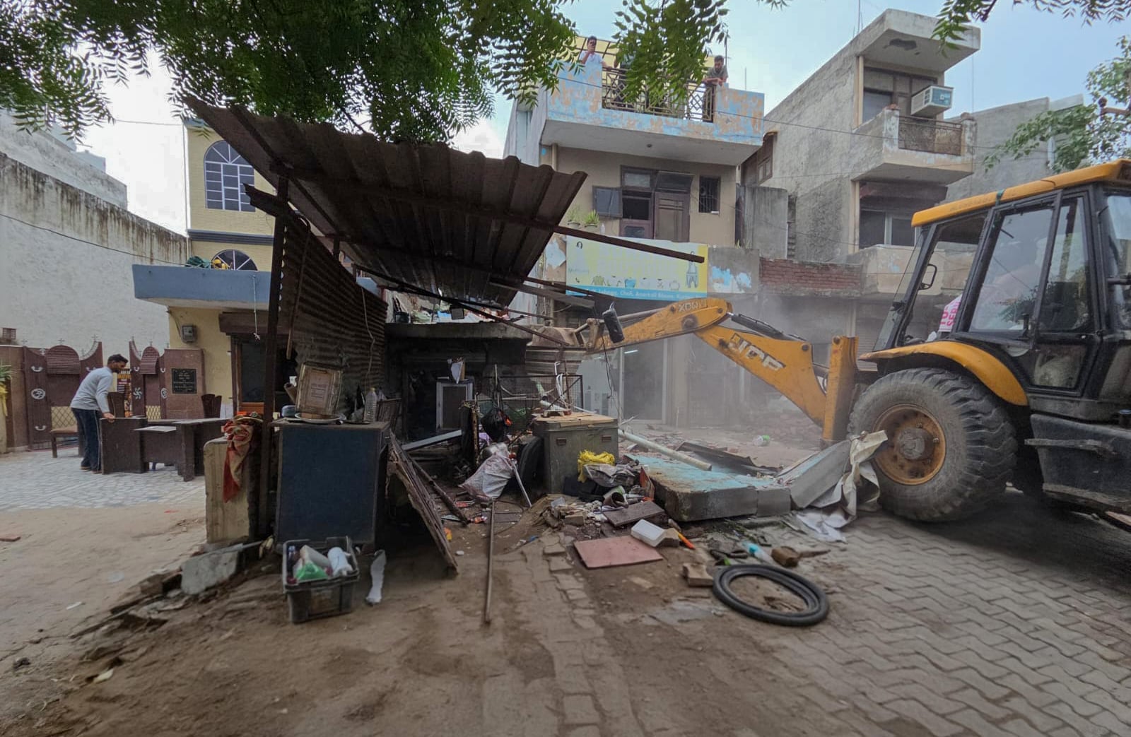 A GMDA team razes encroachments on master sector roads in Gurugram’s Sector 5 on Monday. (HT photo) A GMDA team razes encroachments on master sector roads in Gurugram’s Sector 5 on Monday. (HT photo)