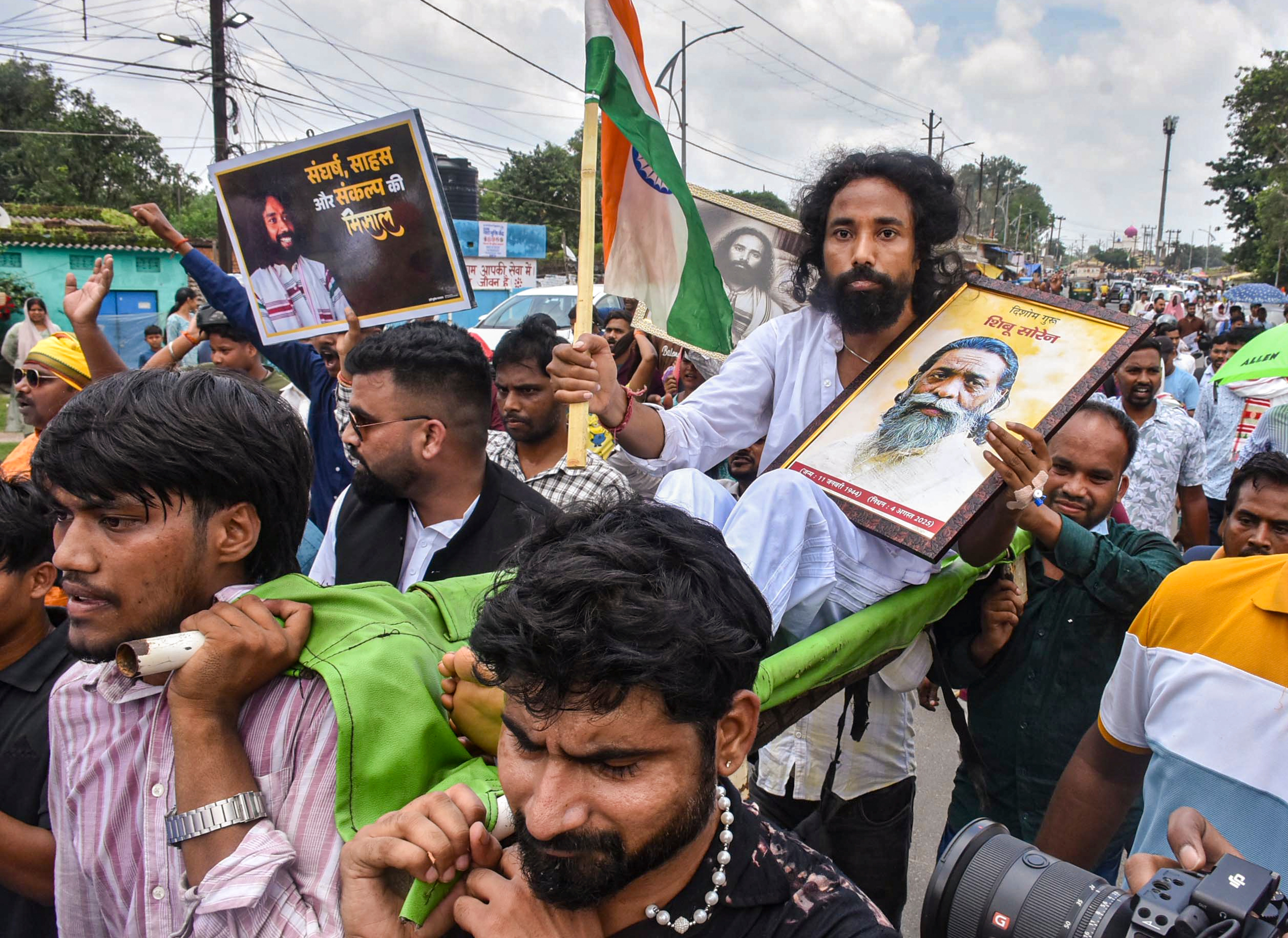 Student leader Devendra Nath Mahto being carried during the march towards the Jharkhand assembly in Ranchi on Monday, August 10, 2026. (PTI) Student leader Devendra Nath Mahto being carried during the march towards the Jharkhand assembly in Ranchi on Monday, August 10, 2026. (PTI)