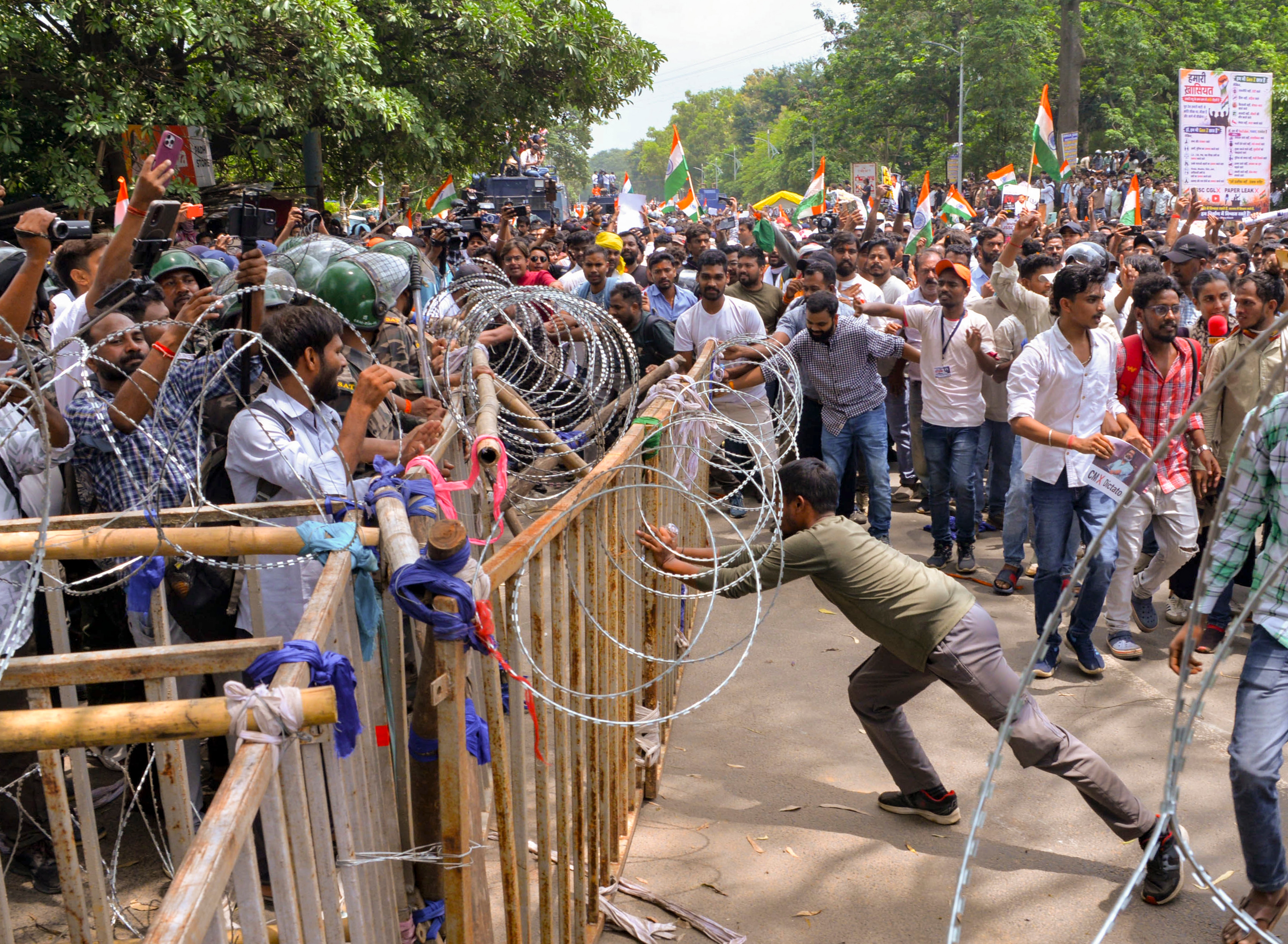 Ranchi: Security personnel stand guard as people march towards Jharkhand Assembly amid a protest over alleged irregularities in the 14th JPSC examination, JSSC-CGL and other recruitment tests, demanding resignation of Jharkhand Chief Minister Hemant Soren and CBI probe on paper leaks, in Ranchi, Jharkhand, Monday, Aug. 10, 2026. (PTI Photo)(PTI08_10_2026_000119A)(PTI08_10_2026_000160A) (PTI) Ranchi: Security personnel stand guard as people march towards Jharkhand Assembly amid a protest over alleged irregularities in the 14th JPSC examination, JSSC-CGL and other recruitment tests, demanding resignation of Jharkhand Chief Minister Hemant Soren and CBI probe on paper leaks, in Ranchi, Jharkhand, Monday, Aug. 10, 2026. (PTI Photo)(PTI08_10_2026_000119A)(PTI08_10_2026_000160A) (PTI)