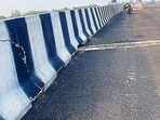 A cracked crash barrier on the elevated portion of the Lucknow-Kanpur Expressway. (SOURCED)