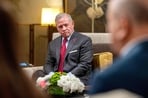 This handout picture released by the Jordanian Royal Palace shows Jordan's King Abdullah II during a meeting with foreign Ministers from Arab and Islamic countries to discuss Israeli actions in Jerusalem and the situation at the Aqsa mosque complex, in Amman on August 5, 2026.
(AFP)