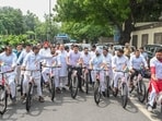 AAP MLAs Saurabh Bharadwaj and Sanjeev Jha, along with others, cycle to the Delhi Assembly as part of a symbolic protest against the alleged bicycle scam in the Delhi government, near Ambedkar Memorial, Civil Lines, in New Delhi on Monday.