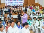 Uttarakhand Chief Minister Pushkar Singh Dhami interacts with students during the ‘Chief Minister Youth Student Conclave’ at the Chief Servant Bhawan, in Dehradun on Monday. 