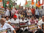 BJP leaders stage sit-in outside CM’s residence in Ranchi on Monday. (HT PHOTO)