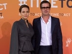 Brad Pitt with his ex-wife Angelina Jolie. (Photo by CARL COURT / AFP)