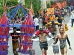 Shiva devotees carrying holy Ganga water from Haridwar walk along the Delhi-Meerut Road during the Kanwar Yatra.(HT Photo/representational)