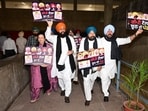 Leader of Opposition Partap Singh Bajwa and other Congress MLAs protesting against the state government on the last day of the monsoon session of the Punjab Legislature in Chandigarh on Monday. (Ravi Kumar/ HT)