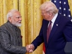 "They are going to work that out amongst themselves, and it's not for me to get between that," Navarro said on US President Trump and PM Modi.