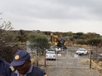 The cave-in happened while the miners were operating illicitly near the city of Rustenburg, a hub for platinum mining in South Africa about 130 kilometers (80 miles) northwest of Johannesburg.