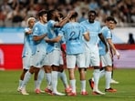 Manchester City's Rayan Ait Nouri celebrates scoring their first goal with teammates(REUTERS)