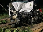 The car which was abandoned by its driver following the mishap near mishap Kalajhar toll plaza in Sangrur on Sunday.