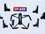 Weapons and drones seized by police.