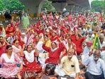 Workers during the protest outside the Mini Secretariat and the DC office in Ludhiana on Monday. (Gurpreet Singh/HT)