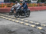 Speed breakers are intentionally painted in contrasting colours to improve visibility. 