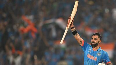 India's Virat Kohli celebrates after scoring a century (100 runs) during the 2023 ICC Men's Cricket World Cup one-day international (ODI) match between India and Bangladesh at the Maharashtra Cricket Association Stadium in Pune on October 19, 2023. (Photo by Punit PARANJPE / AFP) / -- IMAGE RESTRICTED TO EDITORIAL USE - STRICTLY NO COMMERCIAL USE -- (AFP) India's Virat Kohli celebrates after scoring a century (100 runs) during the 2023 ICC Men's Cricket World Cup one-day international (ODI) match between India and Bangladesh at the Maharashtra Cricket Association Stadium in Pune on October 19, 2023. (Photo by Punit PARANJPE / AFP) / -- IMAGE RESTRICTED TO EDITORIAL USE - STRICTLY NO COMMERCIAL USE -- (AFP)