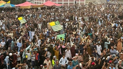 Supporters of the Joint Awami Action Committee (JAAC) gather during a week-long protest in Rawalakot, in Pakistan-administered Kashmir on June 24, 2026, following the group's ban under anti-terrorism laws by local authorities. A nearly two-week standoff between protesters and police in Pakistan-administered Kashmir has left residents grappling with food shortages, while the death toll from clashes rose to 22, according to an AFP tally on June 17. (Photo by AFP) (AFP)