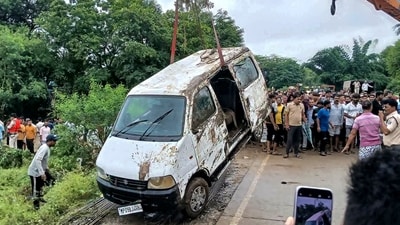 Rajgarh: A crane lifts a van out of a flooded drain at Padana village, in Rajgarh district, Madhya Pradesh. Nine people died and two survived after the vehicle was swept away while crossing an overflowing bridge (PTI) Rajgarh: A crane lifts a van out of a flooded drain at Padana village, in Rajgarh district, Madhya Pradesh. Nine people died and two survived after the vehicle was swept away while crossing an overflowing bridge (PTI)