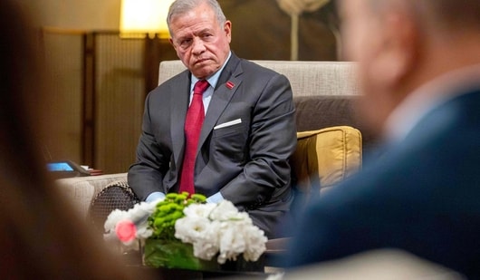 This handout picture released by the Jordanian Royal Palace shows Jordan's King Abdullah II during a meeting with foreign Ministers from Arab and Islamic countries to discuss Israeli actions in Jerusalem and the situation at the Aqsa mosque complex, in Amman on August 5, 2026.