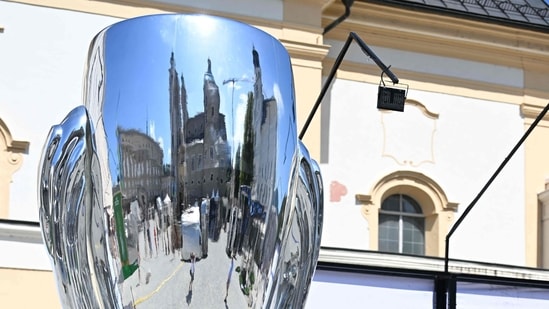A giant replica of the UEFA Super Cup trophy is pictured at a fan area in the city centre of Salzburg, Austria.