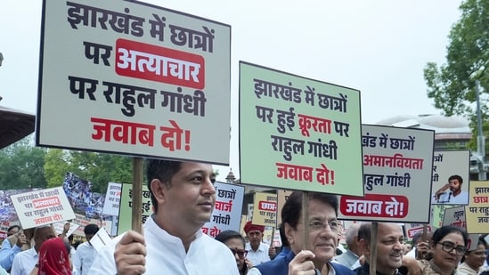 BJP MP Arun Govil and other ruling NDA MPs stage a protest against the �brutal� police action on job aspirants in Jharkhand.