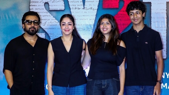 Suriya and Jyothika with their children Diya and Dev in Mumbai at System screening. 